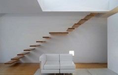 wood-floating-staircase-in-Tolo-House-designed-by-Alvaro-Leite-Siza-588x373
